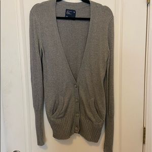 Long button up cardigan. Long sleeves for folding/scrunching. 29” neck to bottom
